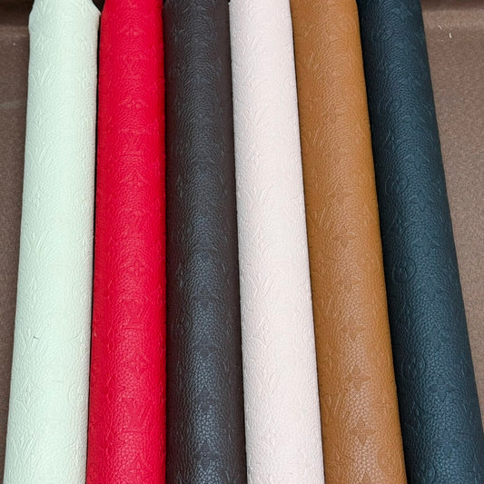 INWARD EMBOSSED LOGO LEATHER