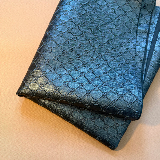 INWARD EMBOSSED LOGO LEATHER